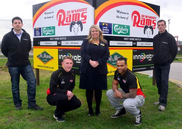 Dewsbury Rams unveil a new match advertising board at the entrance to Tetleys Stadium. Vahid Pudic, Ryan Wright, Hayley Cook, Austin Buchanan and Craig Gomersall. (D536D409)