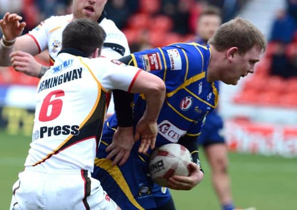Solid defence: Rams stand-off Tom Hemingway stops a Doncaster attack during Sundays Championship clash.