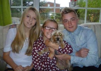 Bella the dog back home with her family in Hull.