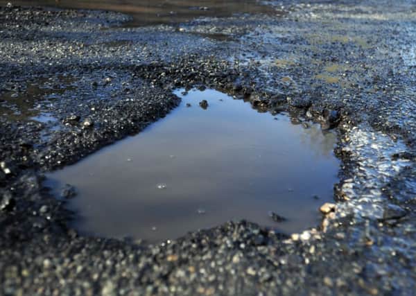 ROAD BLIGHT The cash will help to repair potholes