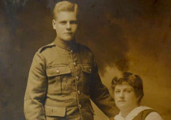 Pte Wilson with his mother. (D541E404)