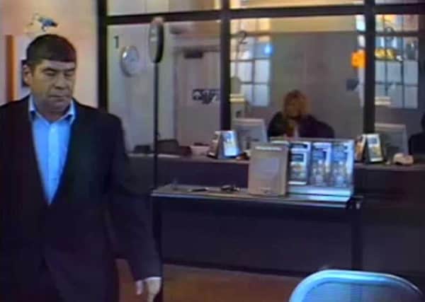Police want to speak to this man about a fraudulent business cheque.