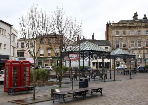 NEW PLAN Market Place will still have two bandstands.