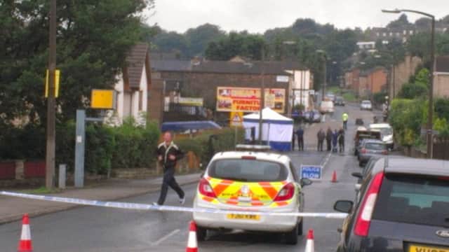 Police closed Heckmondwike  Road after a body was found in a burning van in the early hours of Saturday morning.