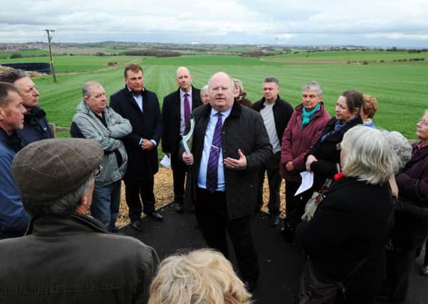 HOMES FIGHTBACK Secretary of State for Communities and Local Government Eric Pickles MP visited campaigners from the Chidswell Action Group, who are fighting proposed development on the green belt, last April.