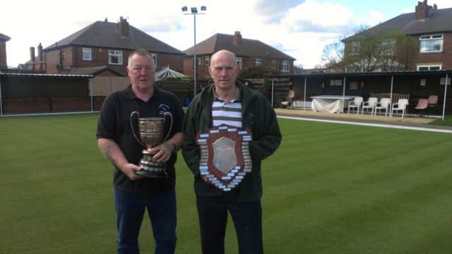 Mel Dearden and Jerry Hird with the Batley Rate Payers bowls trophies.