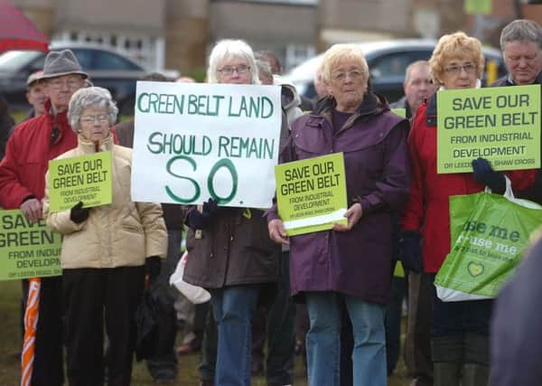 HOMES PROTEST Chidswell Action Group protestors on Shaw Cross playing fields, green belt land which is under threat