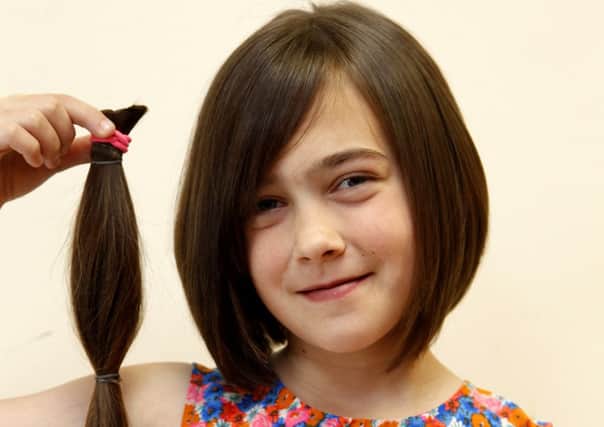 Madison Vickers cuts her hair for Little Princess Trust.