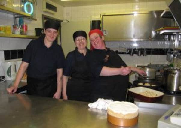 ALL SMILES Sara and her team at Stanleys, which was this week given £15,000 to help with their work.