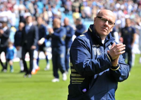Brian McDermott applauds the fans at the end of Leeds United's final game of the season. Picture: Bruce Rollinson