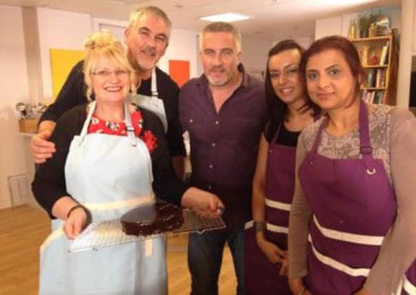 Paul Hollywood with his cooking group, including Salma and Aysha Karolia.