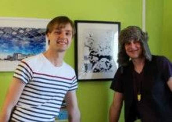 ON SHOW Matthew Crowther and Jason Feather view the exhibition.