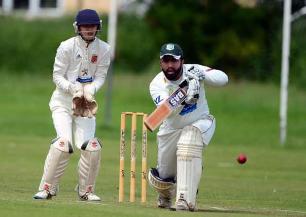 Mohammed Bashir in Heavy Woollen Cup action for Scholes against Methley last Sunday.