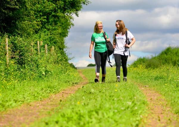 Jodie Wilkinson and Laura Scott are taking on the Yorkshire Three Peaks in aid of MacMillan and Teenage Cancer Trust. (D523E422)