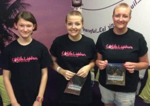 Rachael Varley, Ella Crann and Emma Turnbull cut their hair for charity.