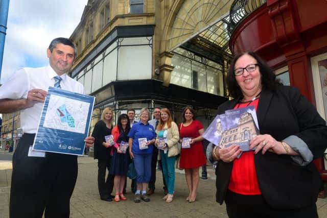 HIGH HOPES John Lambe and Coun Cathy Scott lead an event to promote the Townscape Heritage Initiative. (d534e424)