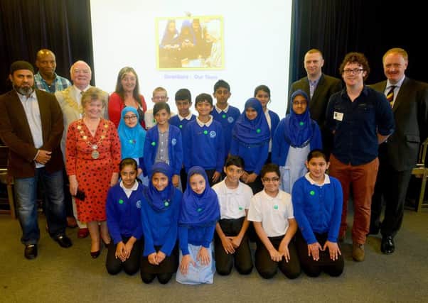 OUR TOWN Year 5 Boothroyd pupils with Ken Smith, Simon Reevell, Reporter Series editor Hannah Ridgeway and guests.