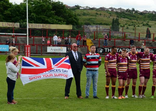 TOUCHNG MOMENT Lance Corporal Sean Donlan led out the Batley Bulldogs as part of Armed Forces Day.
