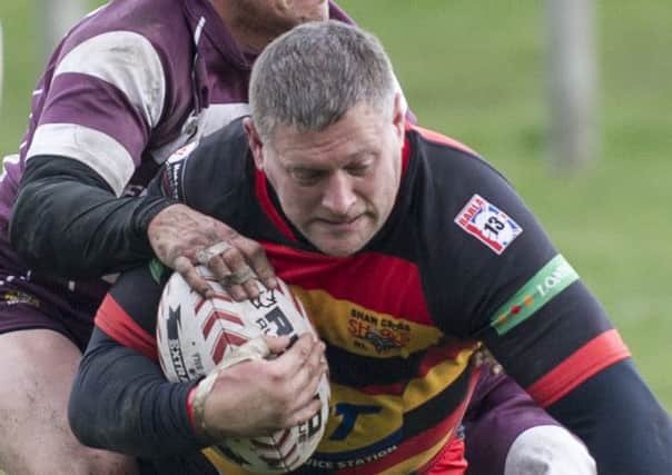 Andy Burland crossed the whitewash as Shaw Cross Sharks drew 24-24 at York Acorn.