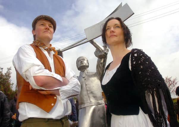 The unveiling of the world's only memorial to the Luddites. A sculpture of a cropper and his daughter in the new park on the junction of Knowler Hill and Halifax Road, Liversedge.
