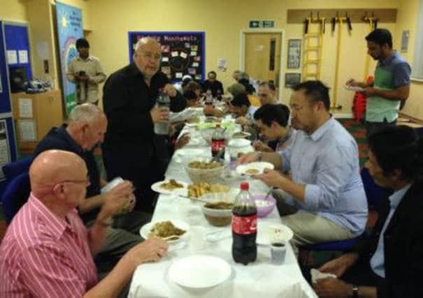Community unites Residents gather at iftar event at St Johns Infant School in Dewsbury.