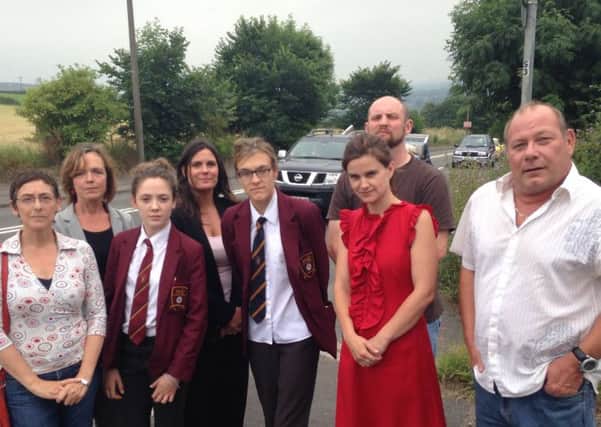 ROAD SAFETY Coun Steve Hall and Jo Cox, right, with campaigners.