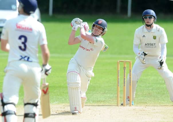 Cleckheaton's James Lee launches a six
