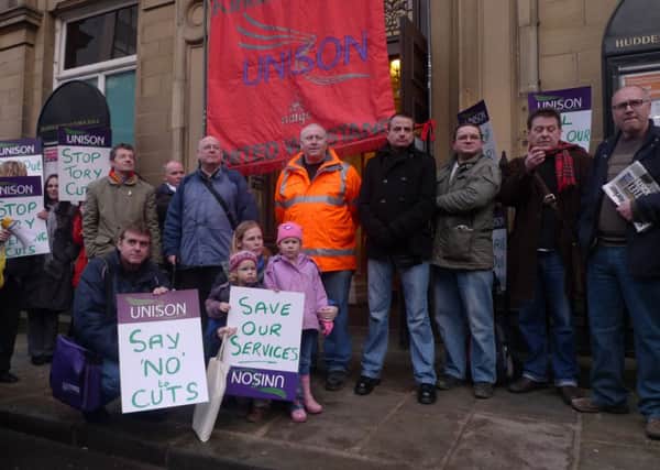 PICKET LINE Unison workers have protested in the past about Kirklees Council budget cuts.