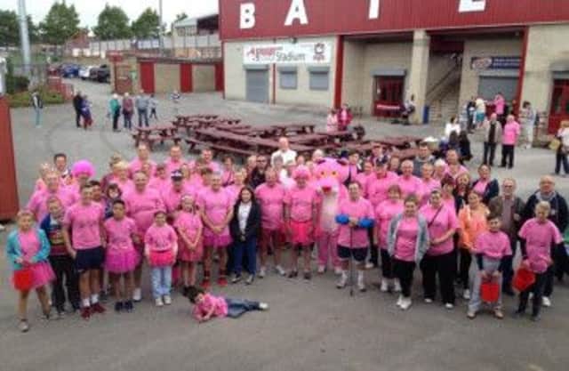 Batley Bulldogs fans wear pink in aid of breast cancer charities.