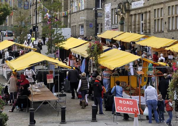 UNDER THREAT Batley and Birstall's markets could be shut down if the council's cuts go ahead.