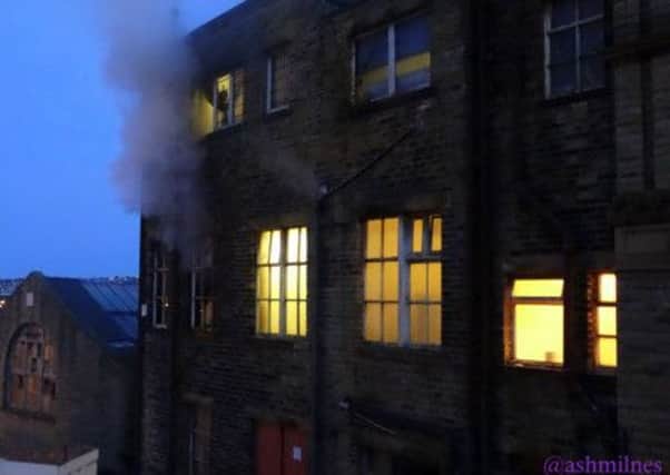 Smoke pours out of the former Dewsbury Library building.
