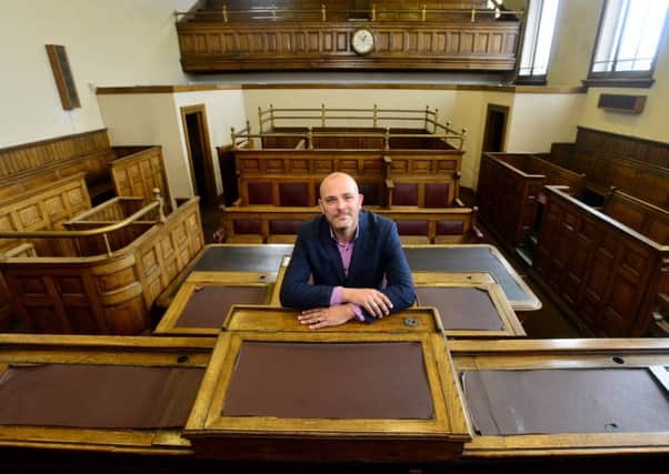 ORDER, ORDER Richard Batterby in the old court room, which was in use until 1982. (d536a436)