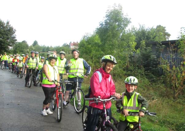 FANTASTIC DAY Families take part in a Street Bikes ride along the Spen Valley Greenway.