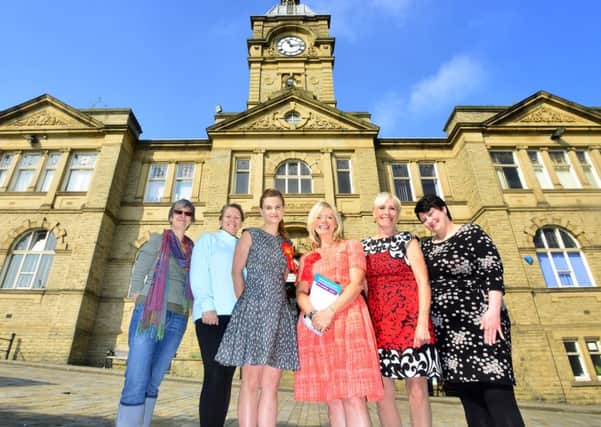 Tracy Brabin and Jo Cox outside Batley Library, with Julie Smith, Alison Downie, Maxine Parsons and Emily Chiappini.