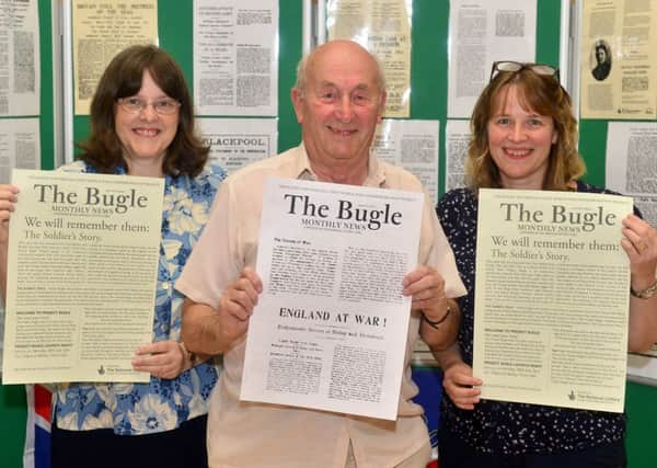 PROUD PROJECT Coun Liz Smaje, chairman of Batley History Group Malcolm Haigh and Alison Fell at the opening event of Project Bugle. Every month the newsletterreports on Batleys WWI heroes.