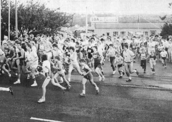 THEY'RE OFF! The first BBA half marathon and fun run in 1984.