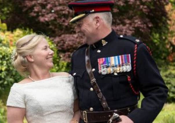 HAPPY COUPLE Major Christopher Ashley Firth and Louise Ellen Fox.