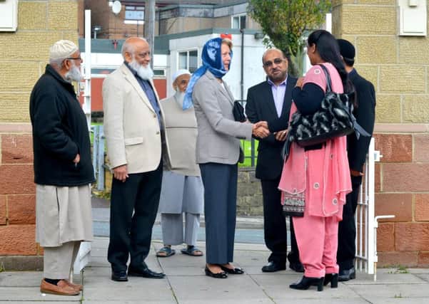 ROYAL REPRESENTATIVE Dr Ingrid Roscoe meets mosque members with Iqbal Bhana OBE. (d545b442)