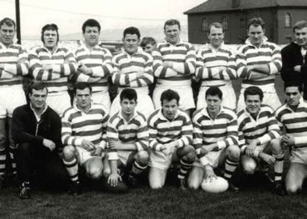 TEAM PLAYER Mr Shuttlework, front row, third from the right.