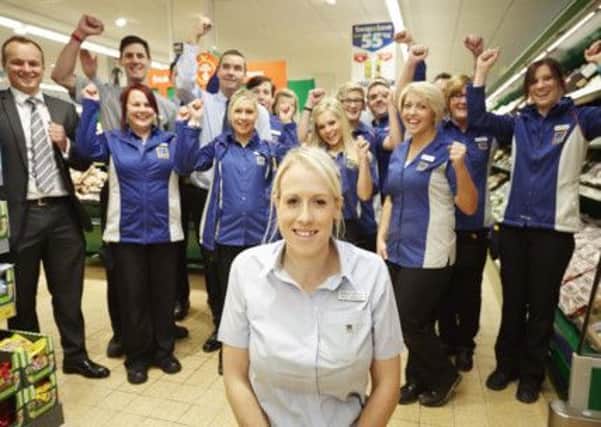 Aldi Batley in Yorkshire has a store-refit.Pictured Manager Donna Carter with her team