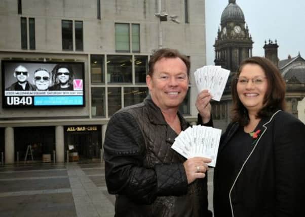 Ali Campbell and Coun Katherine Mitchell on Millennium Square where UB40 will play a special gig next summer.