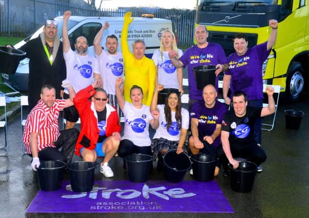 Crossroads Truck and Bus staff in Birstall took on an ice bucket challenge to raise money for Leeds Stroke Association. (D524A445)