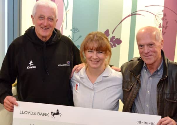 From left: Dave Cowgill, the hospices Nicola Oates, and Dave Shelton.