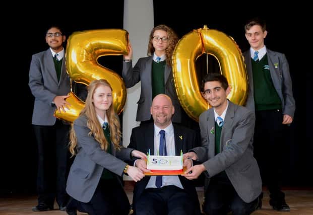Thornhill Community Academy is celebrating its 50th birthday, pictured is headteacher Jonny Mitchell with pupils Anita Bayraktar, Zakir Khan, Bethan Peace, Sahbaan Githroo and Aaron Crowe.  (d622a448)