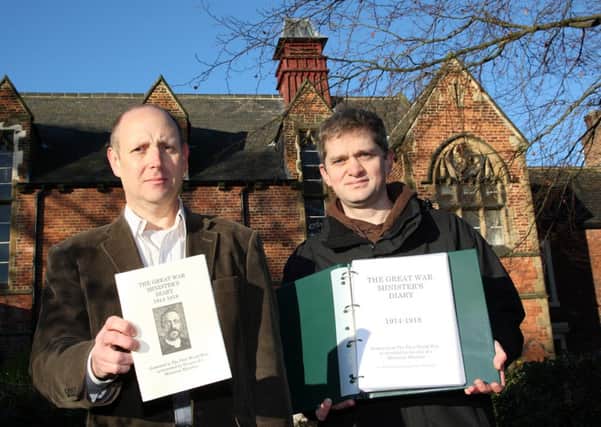 Christopher Shorten and the Rev Michael Newman with the completed booklet. (d231a449)