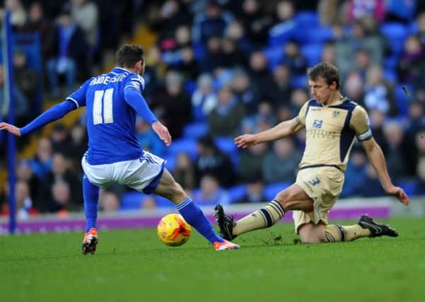 Leeds United's Stephen Warnock takes on Ipswich's Paul Anderson. Picture Jonathan Gawthorpe.