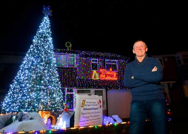 DECEMBER 2014 Derek Highe outside his home in Mirfield.