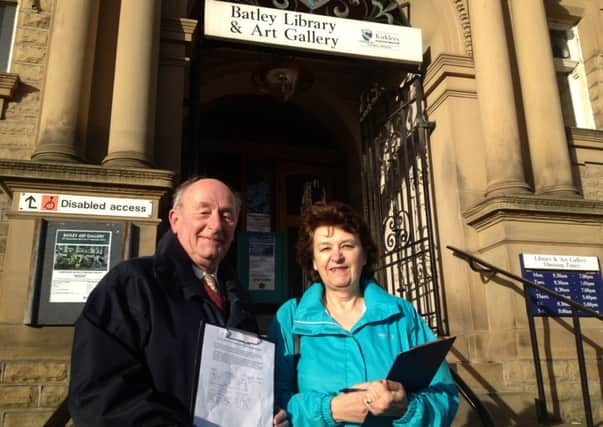 Batley History Groups Malcolm Haigh and Susan White outside Batley Library.