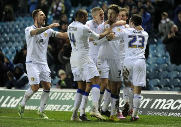 Leeds United players celebrate scoring against Bournemouth.