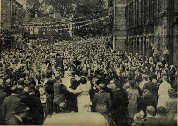 Churchill greeting crowds in Heckmondwike on his last visit to the area in 1945.